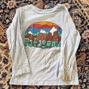 Patagonia Light Blue Long-Sleeve Tee with Colorful Mountain Graphic